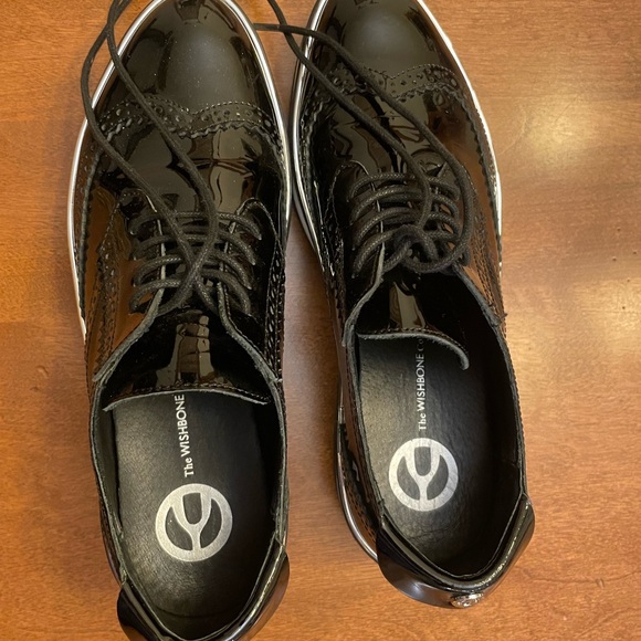 Black Leather Sneakers
Whishbone - Picture 2 of 6